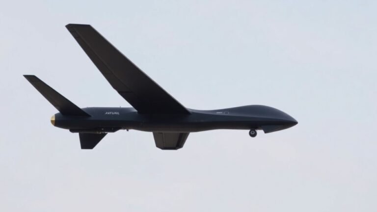 Anduril YFQ-44 Fury drone flying in the sky.