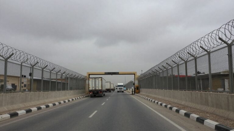 Rafah border crossing with fences and barriers.