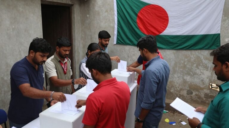 Bangladesh election polling station with voters casting ballots.