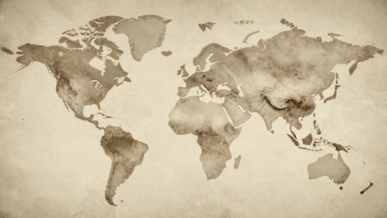Faded world map with dissolving countries.