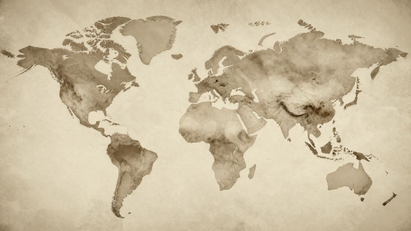 Faded world map with dissolving countries.