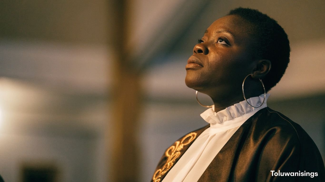 Nigerian gospel singer in a softly lit church